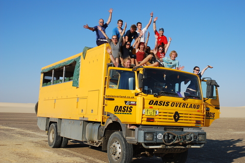 Oasis Overland tour truck and group
